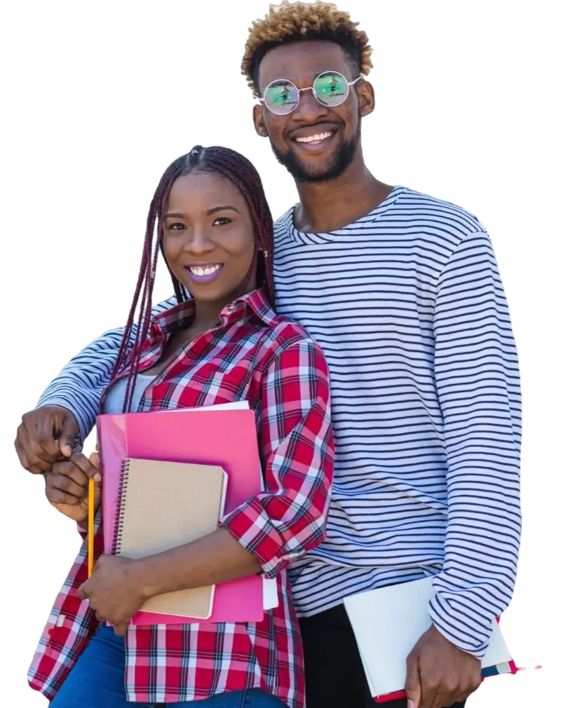 Two people smiling and holding notebooks, standing close together. One wears a plaid shirt, and the other wears a striped shirt and glasses.